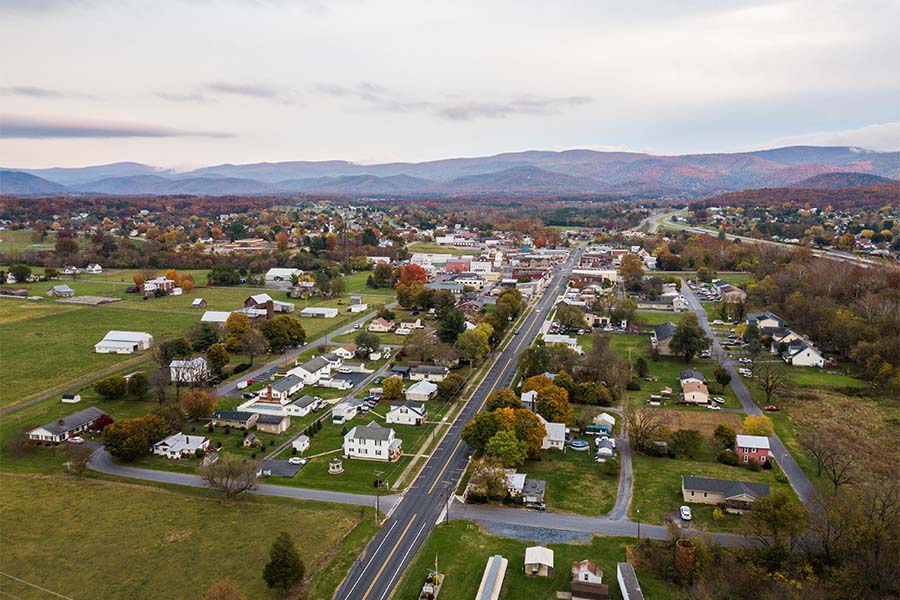 New Market VA - Aerial View of the Small Town of New Market Virginia with Views of Homes and the Mountains in the Distance